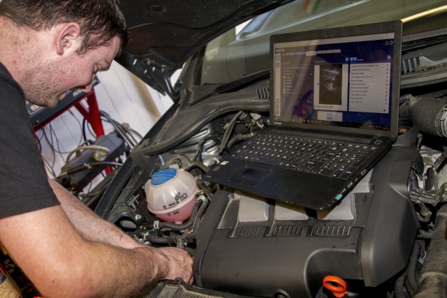 Andrew using the latest technology to diagnose issues with this vehicle